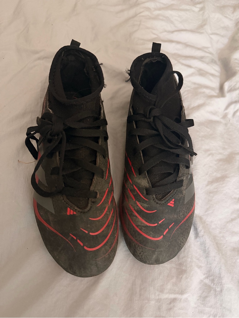 Adidas Predators Black soccer Cleats with Red Accents